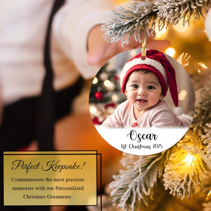 Personalized baby photo Christmas ornament with a baby's picture and text 'Oscar 1st Christmas 2025' against a festive background.