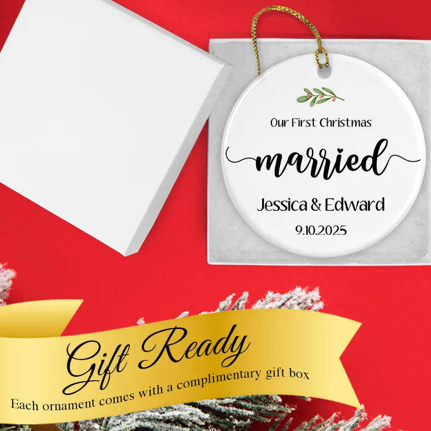 Personalized married Christmas ornament nestled in keepsake gift box with gold ribbon