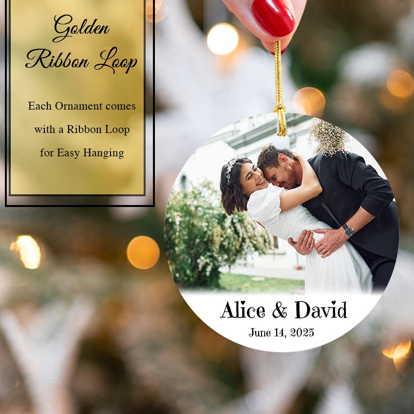Personalized Wedding Christmas ornament with a couple and text 'Golden Ribbon Loop' on a blurred background.