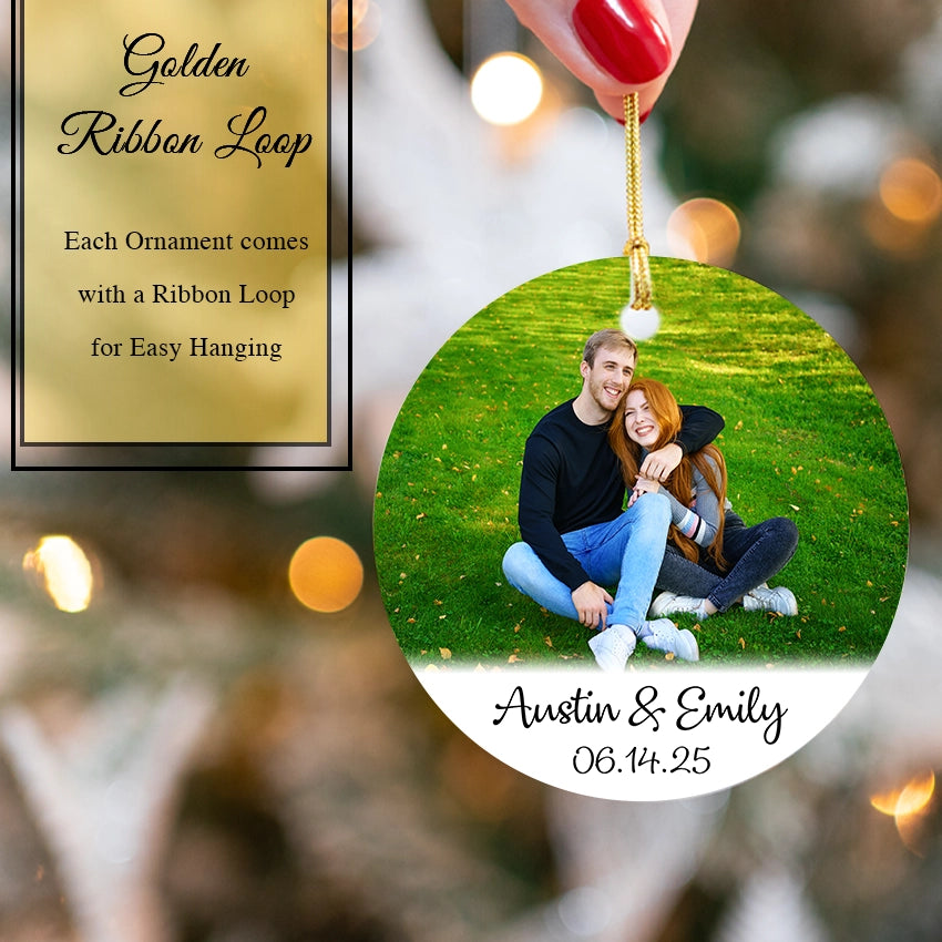 Personalized ornament with a couple photo and text, featuring a golden ribbon loop.