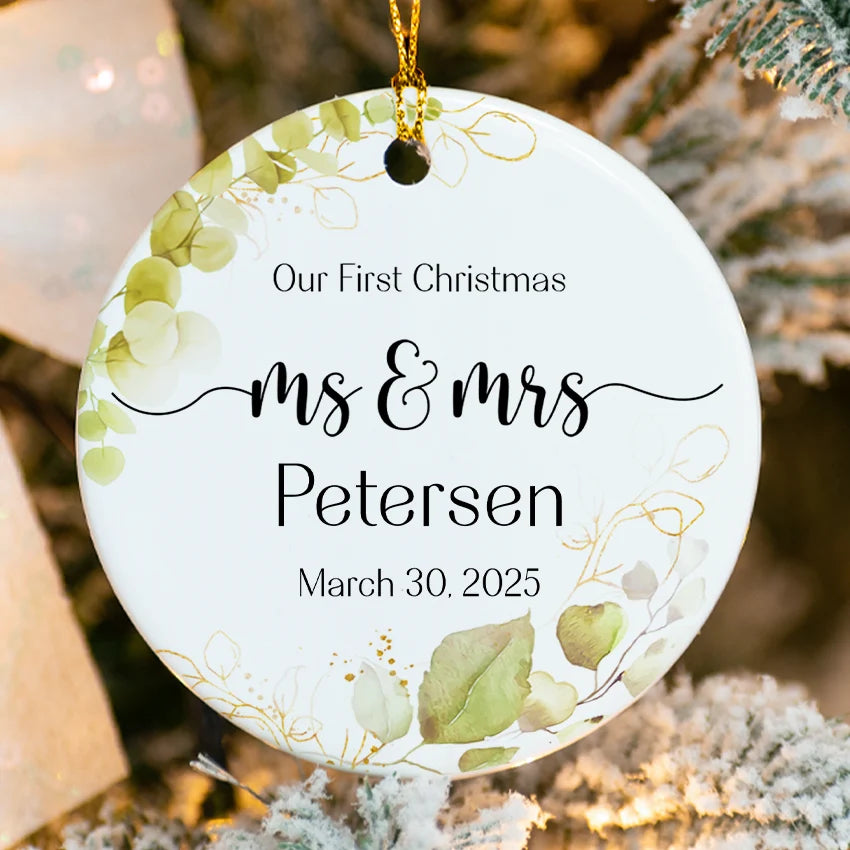 Close-up of glossy white ceramic ornament showing raised edge and personalized Mr. & Mrs. script