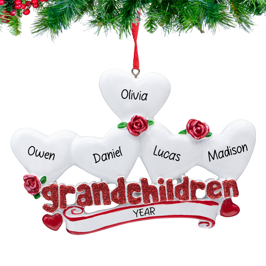 Grandchildren” ornament with five personalized heart charms and 2025 hanging on a snowy Christmas tree branch
