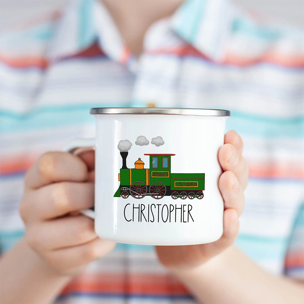 Personalized Train Hot Cocoa Kids Mug held in a child's hand