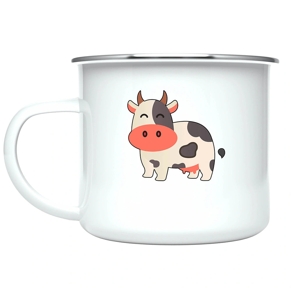Close-up of cow artwork printed on both sides of the children’s mug