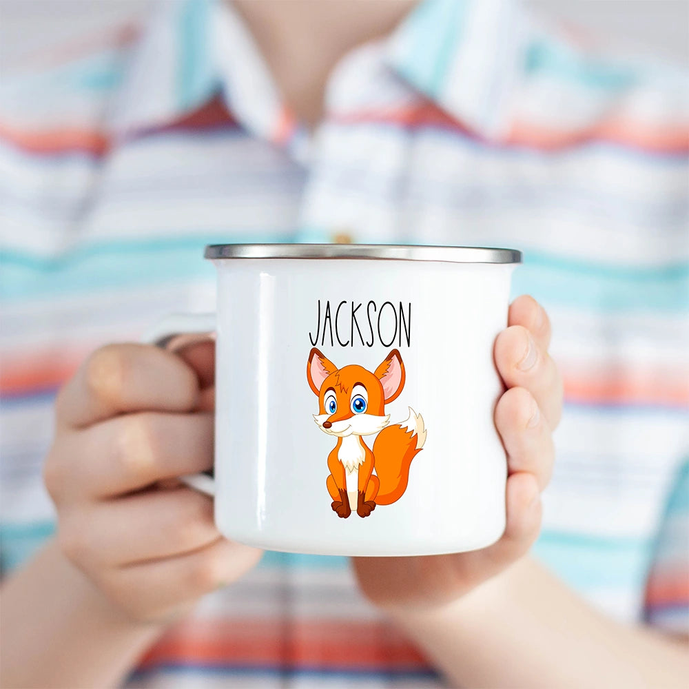 Personalized fox mug held in a child's hand—perfect children’s mug