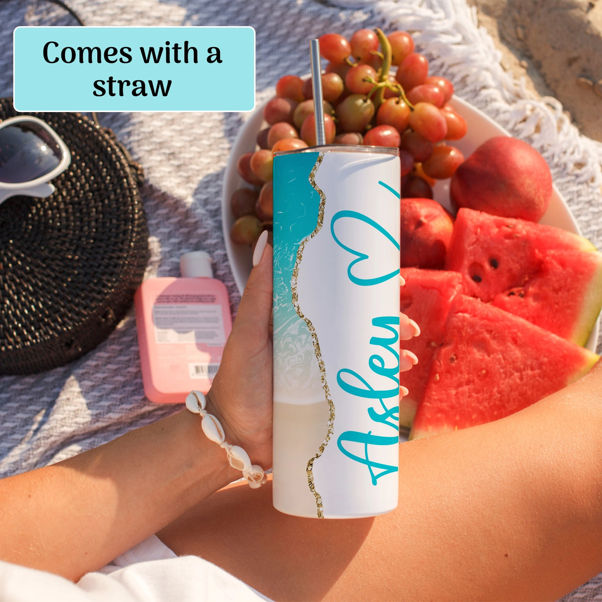 Person holding a personalized tumbler comes with a straw