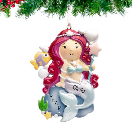 “Personalized mermaid Christmas ornament with hand‑lettered name and year on resin mermaid”