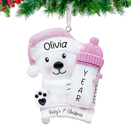 Celebrate your baby girl’s first Christmas with a personalized ornament featuring a bottle design