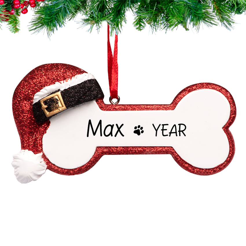 Personalized Christmas ornament dog bone with Santa hat, a festive keepsake.
