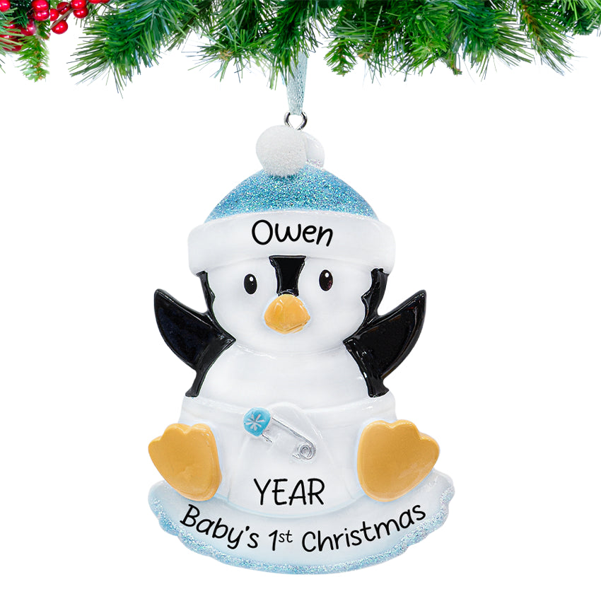 Round ornament with cute baby boy penguin design, personalized with name and year.