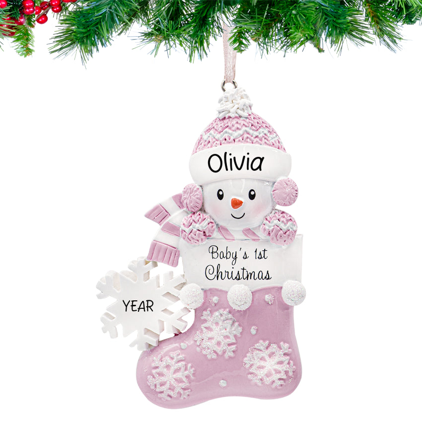 Customized girl baby's first Christmas stocking snowbaby ornament, perfect for celebrating holiday.