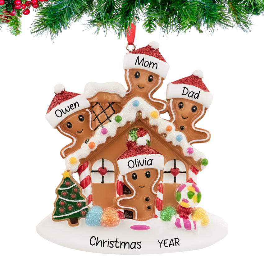 Gingerbread house ornament with a smiling family, personalized with names and 2025, hanging on a festive Christmas tree branch.