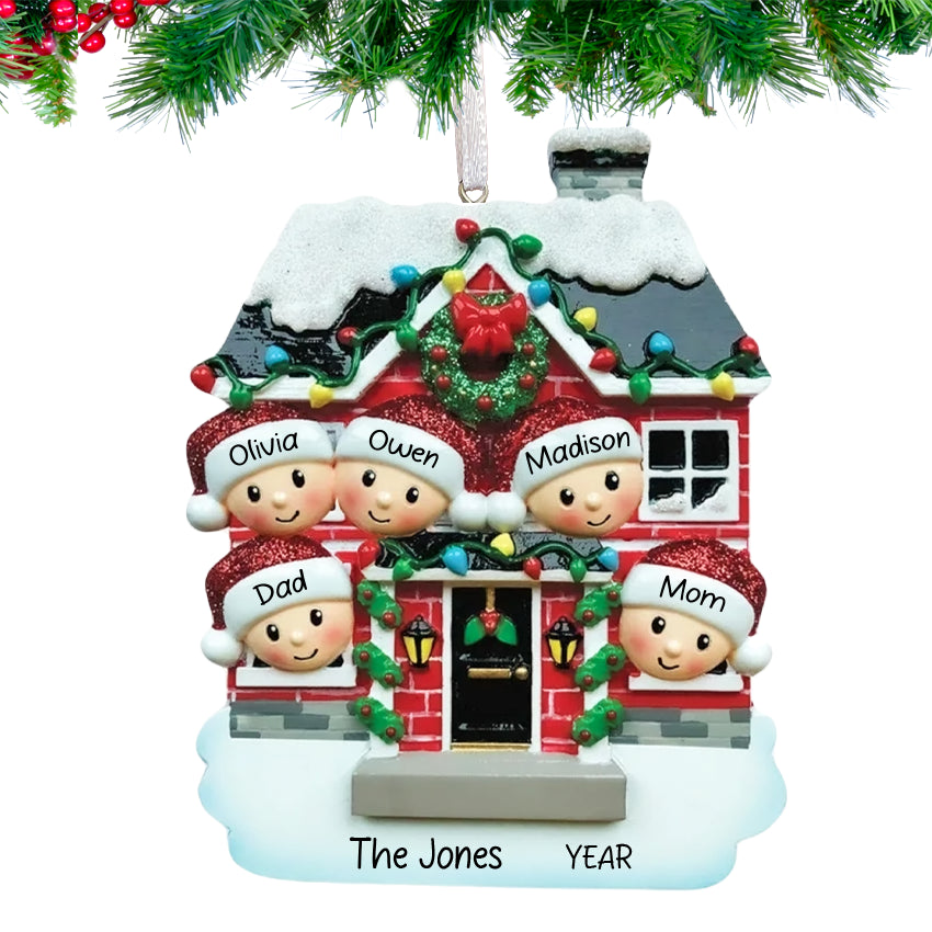 A personalized Christmas ornament featuring a decorated house with a family of five inside, including three children, with the ability to customize the names.
