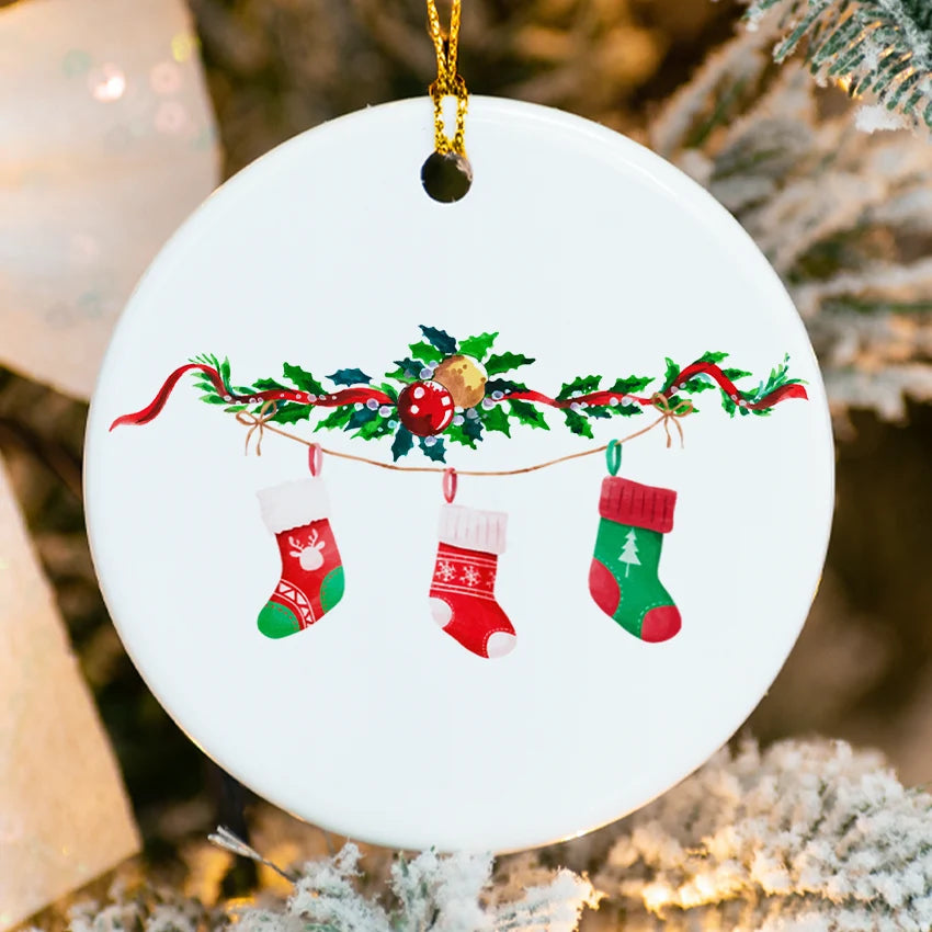 Round ceramic ornament with three colorful stockings personalized for a family of three and dated 2025
