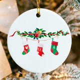Round ceramic ornament with three colorful stockings personalized for a family of three and dated 2025