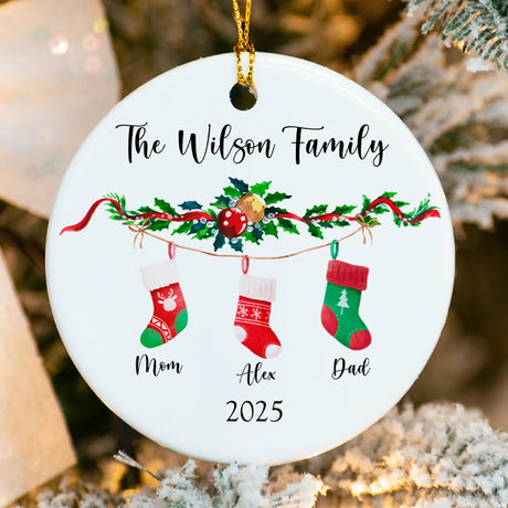 Close-up of glossy porcelain surface showing fused family name and individual stocking names