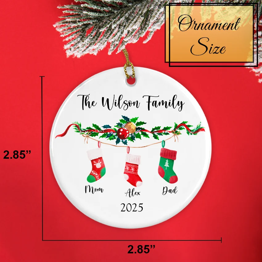 Back view of the ornament displaying smooth white gloss and red satin loop and size