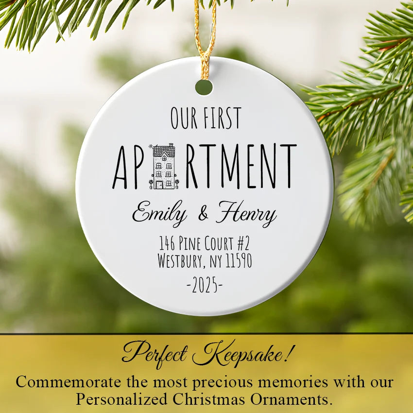 Personalized first apartment ornament hanging on a Christmas tree branch"
