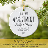 Personalized first apartment ornament hanging on a Christmas tree branch"