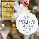 Ornament nestled in its keepsake gift box with gold satin ribbon