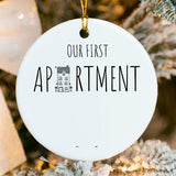 Close‑up of glossy porcelain ornament showing fused street address and year