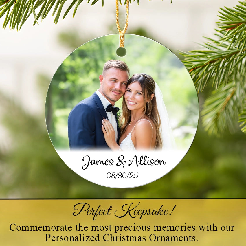 Personalized Christmas ornament with a couple's photo and names, surrounded by greenery. Perfect Keepsake