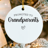 Close‑up of glossy ceramic showing fused Promoted to Grandparents text and personalization