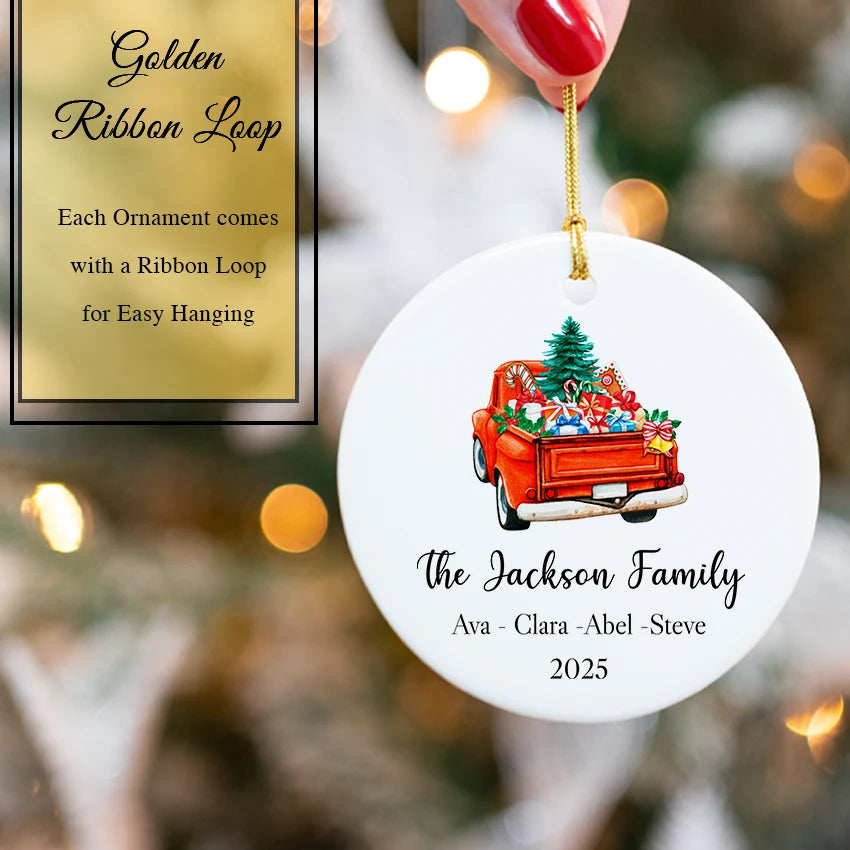 ornament on hand displaying smooth white finish and gold satin ribbon