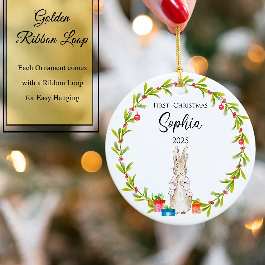 Both Bunny Rabbit Girl ornaments hanging on a Christmas tree with twinkling lights