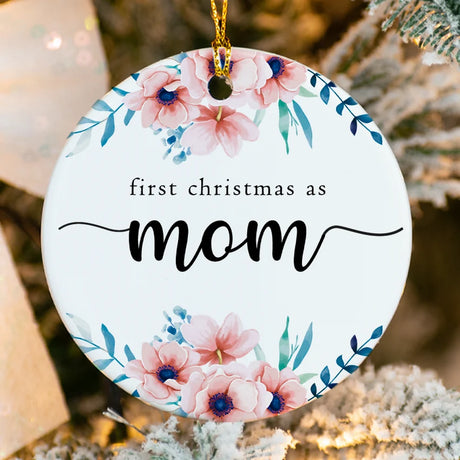 Close‑up of glossy porcelain ornament showing fused First Christmas as Mom text