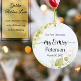 Hand holding the Mr. & Mrs. First Married ornament to show its 2.85-inch diameter