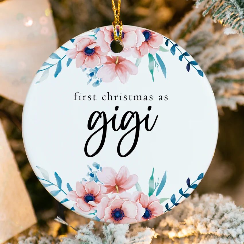 Close-up of glossy porcelain ornament showing fused Promoted to Gigi text and custom details