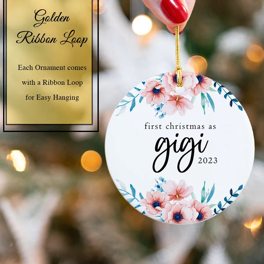 Hand holding the 2.85-inch Gigi ornament to show scale and vibrant colors