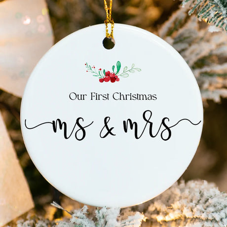 Close-up of etched Ms & Mrs script and laurel detail on high‑gloss porcelain ornament