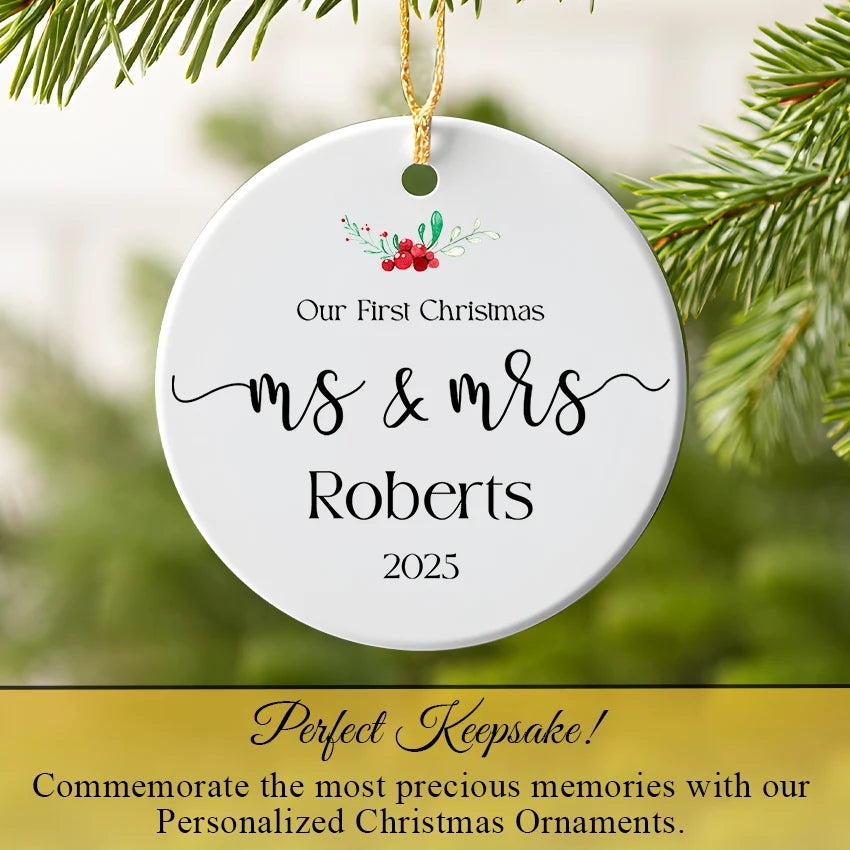 Ms & Mrs wedding ornament hanging from a Christmas tree branch with pine needles