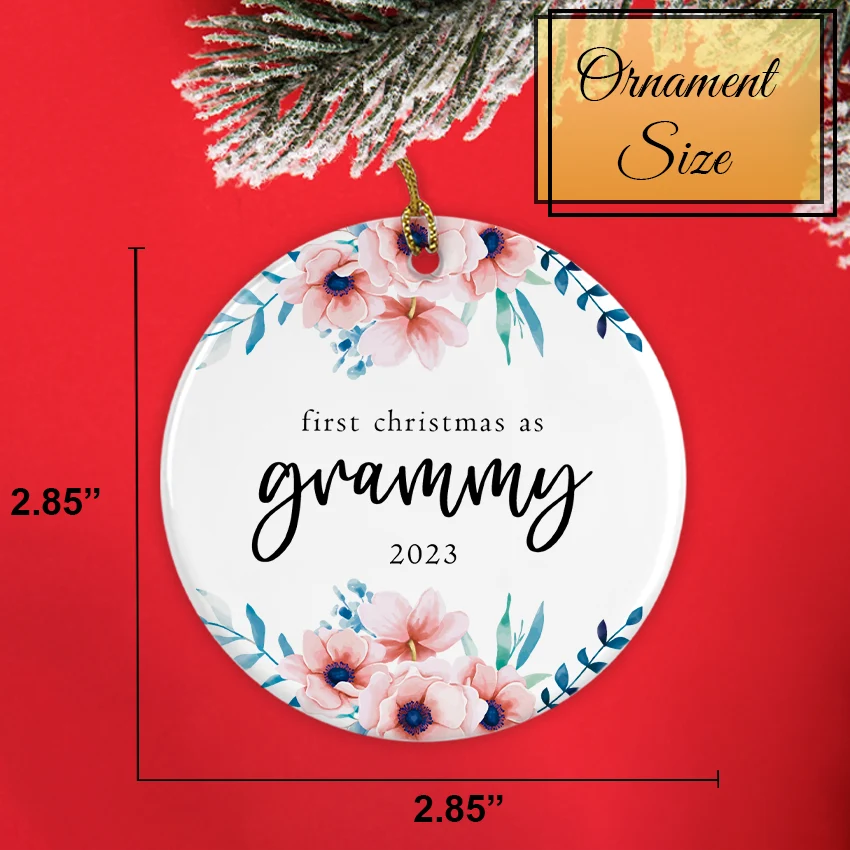 Back side of the ornament displaying smooth white ceramic finish and gold ribbon loop