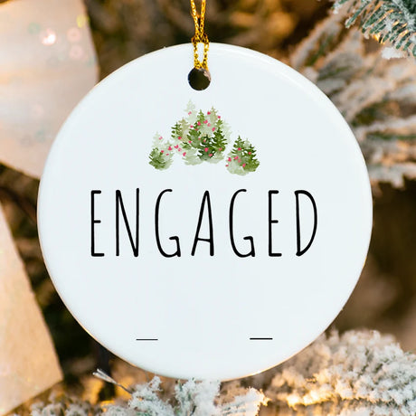 Close-up of lush tropical leaves and orchid details on porcelain engagement ornament