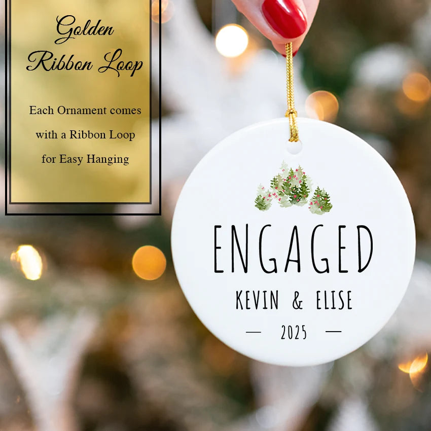 Personalized engagement ornament nestled in its keepsake gift box with gold ribbon