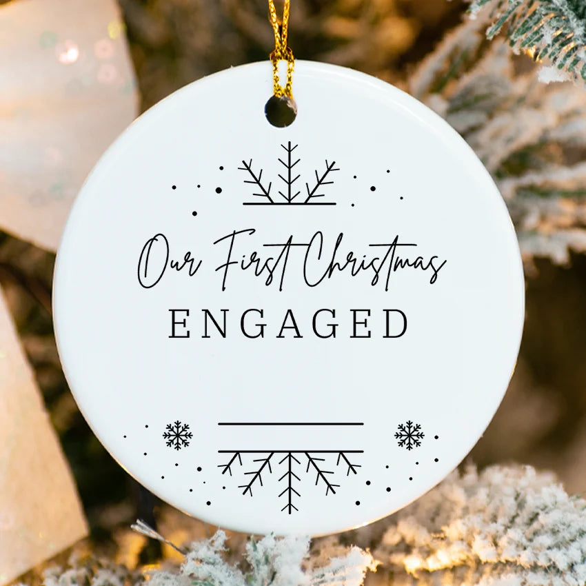 Close-up of glossy porcelain ornament showing fused announcement text and personalized details
