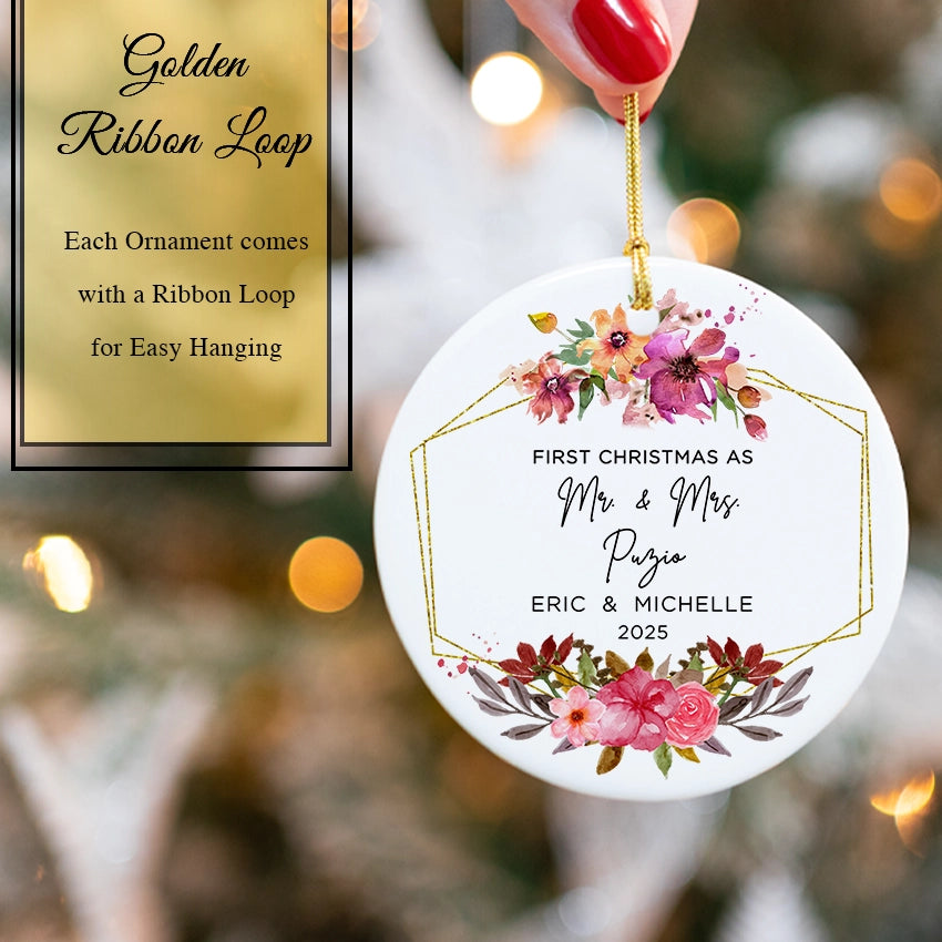 Hand holding the flower bloom ornament to show its 2.85-inch diameter and personalization