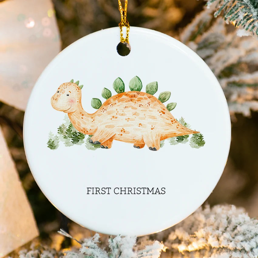 Close-up of Baby Dino ornament showing glossy ceramic finish and fused printing detail
