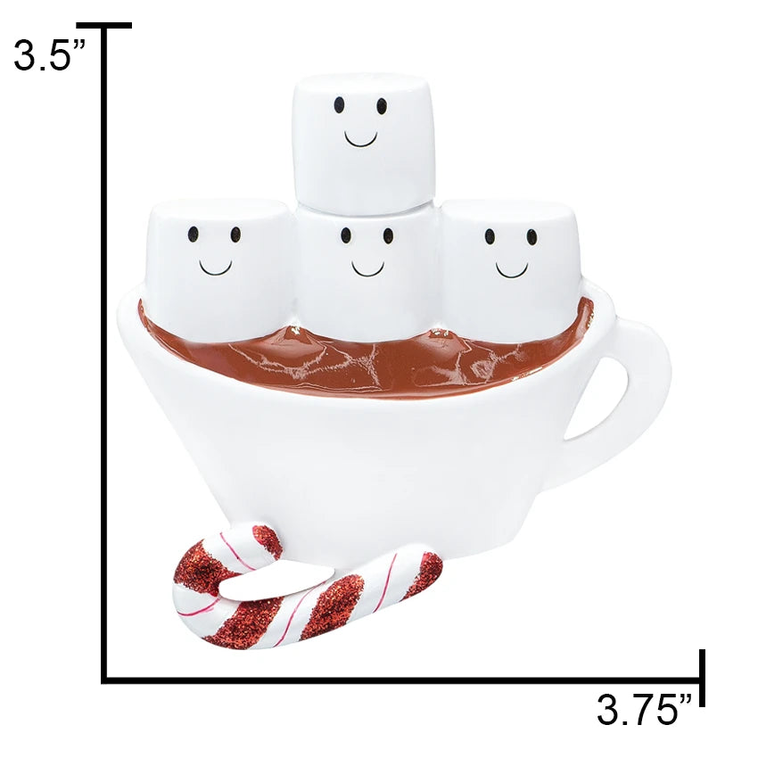 Scale reference: 3.5 3.75 ‑inch hot chocolate family ornament held 