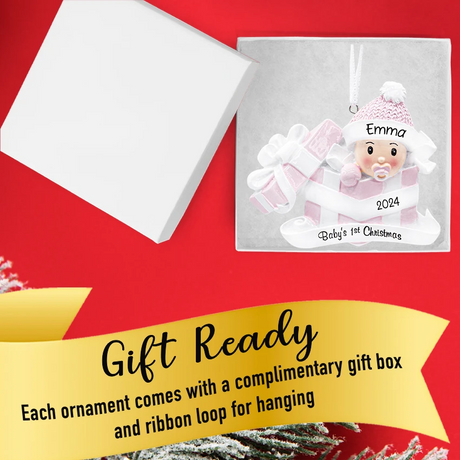 Baby's first Christmas ornament featuring a baby girl in a present, perfect for her first year.
