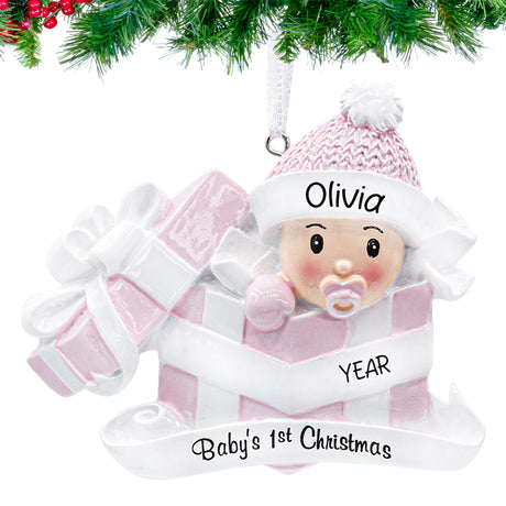 Personalized baby's first Christmas ornament featuring a baby girl in a present, check out now.