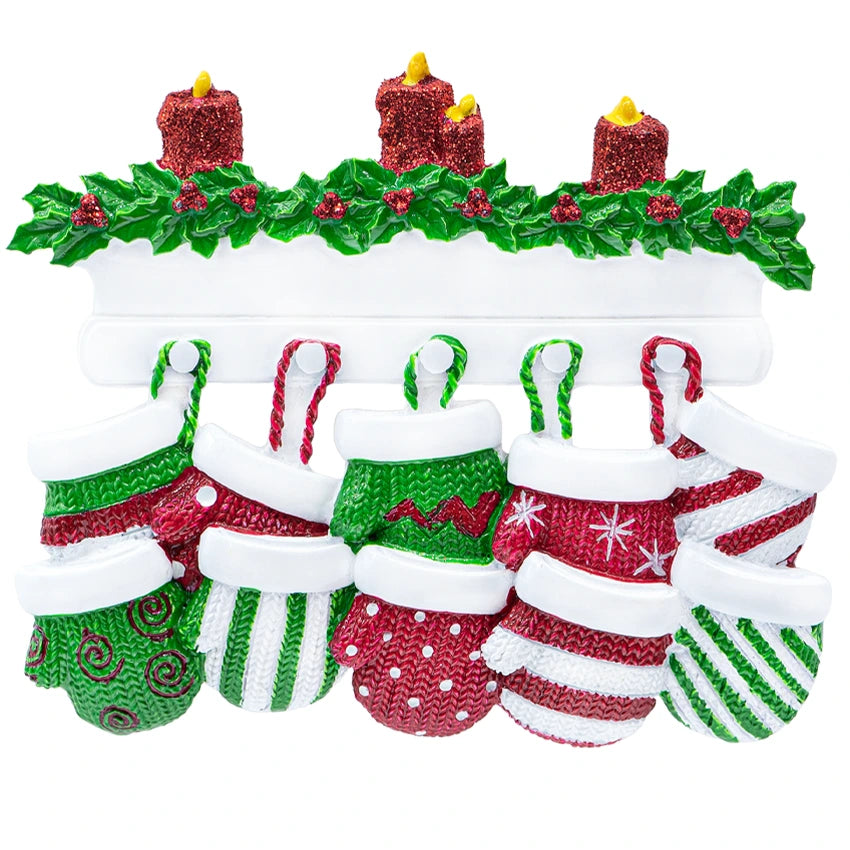 Close‑up of ten detailed resin mittens with hand‑lettered names