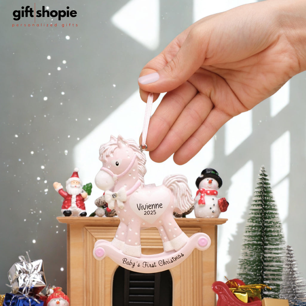 Baby's First Christmas Ornament On Hand Christmas Background