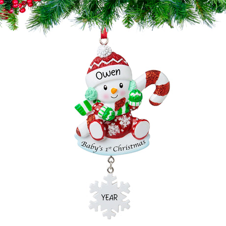 Personalized baby's first Christmas snowbaby ornament with custom name and year, a charming keepsake for a special holiday memory.
