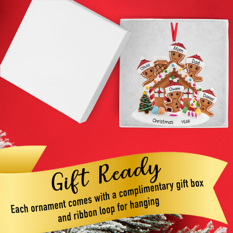 Gift-ready box displaying a personalized gingerbread house ornament for a family, hand-lettered with names and 2025.