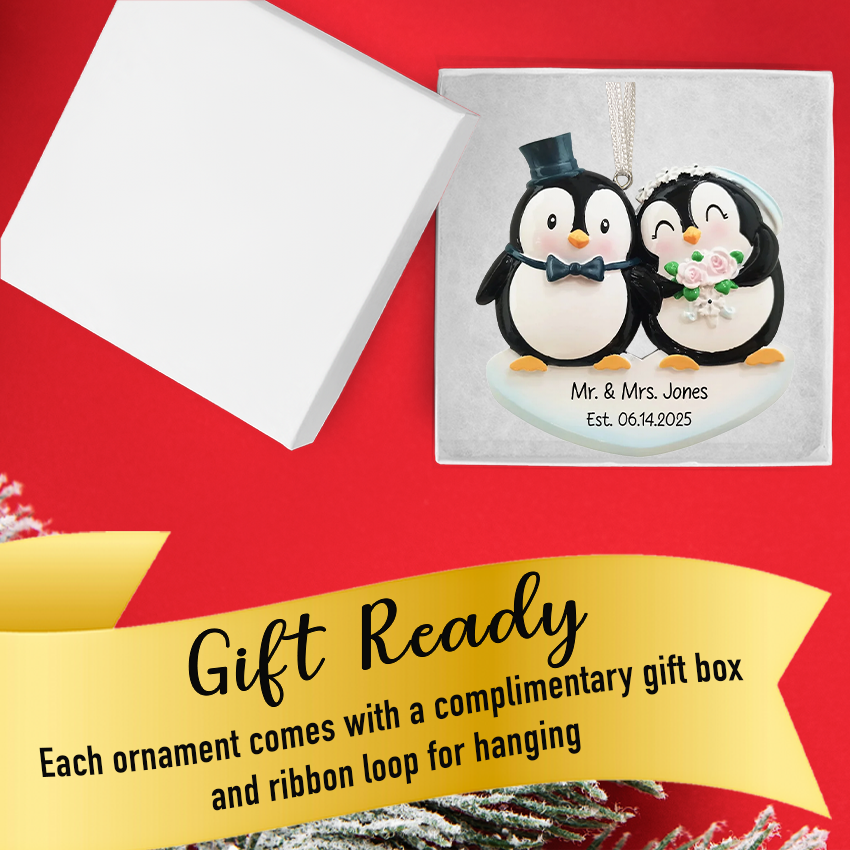 Celebrate your love story with a penguin bride and groom Christmas ornament.