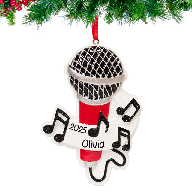 Decorative Christmas ornament with a microphone design, year, and name on a white background.